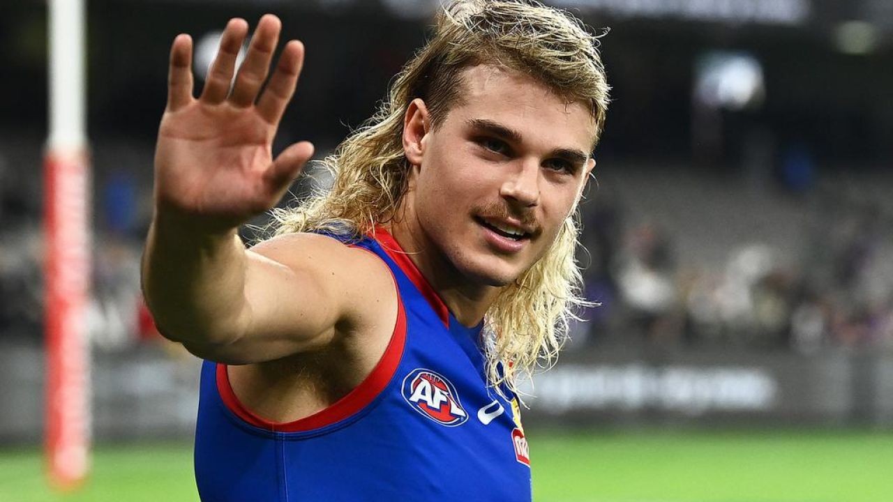 The Reason AFL Players Used to Wear Caps During Matches – How It’s Reshaping Australia’s Economy