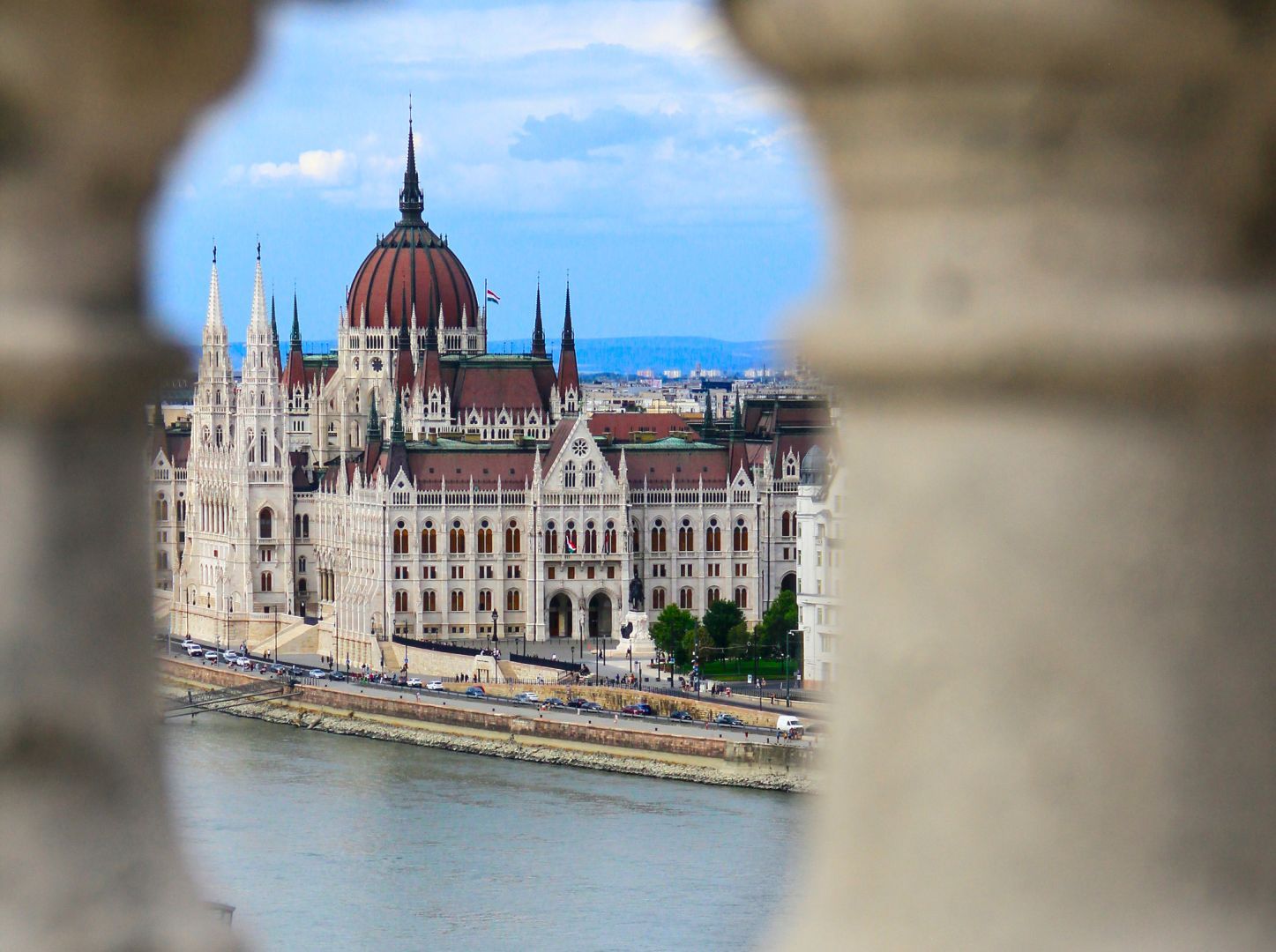 Hungarian Parliament Building from a distance. Some columns are on the foreground