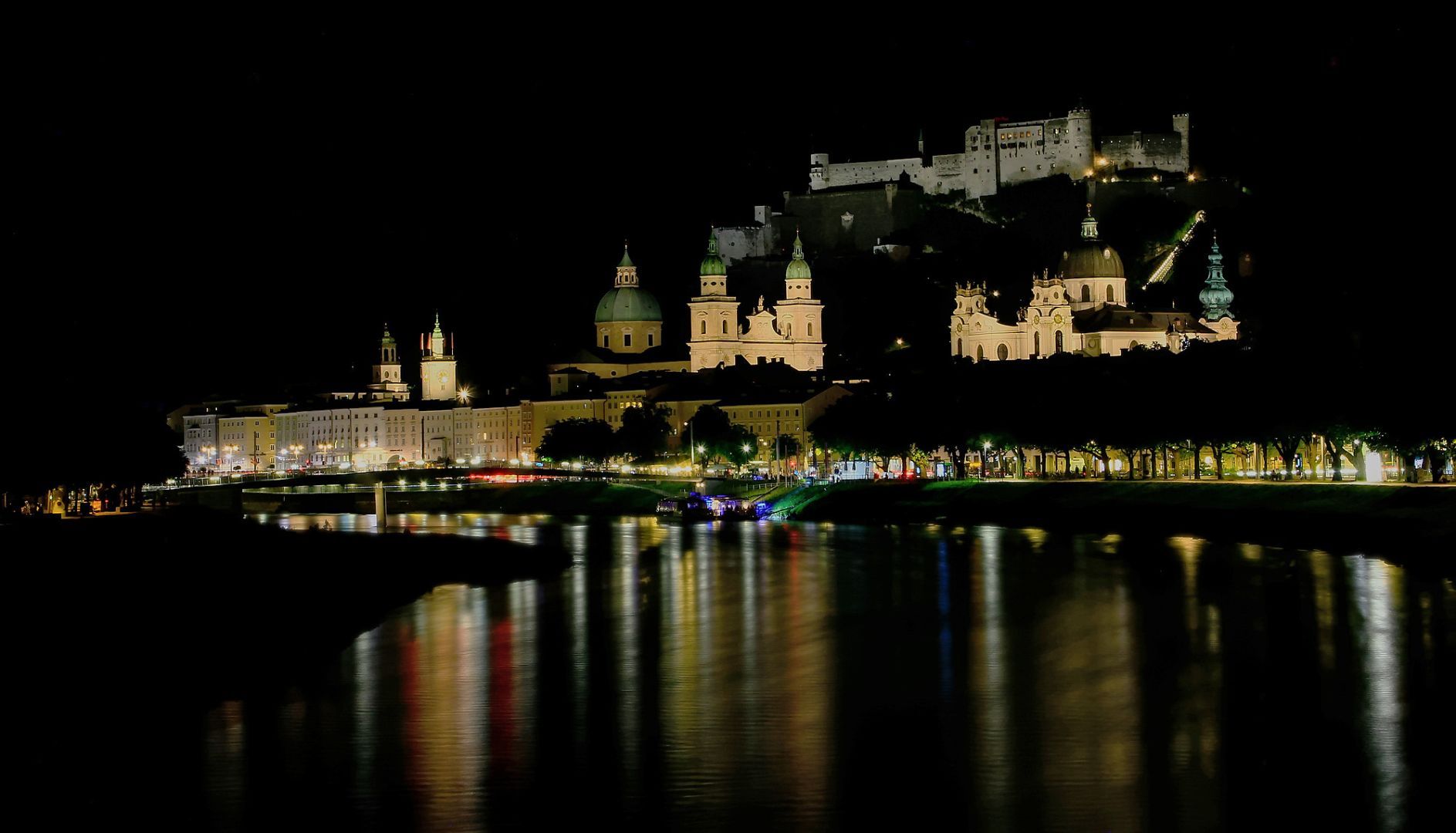 Long exposure shot of Salzburg altstadt at night from the Marko Feingold bridge.